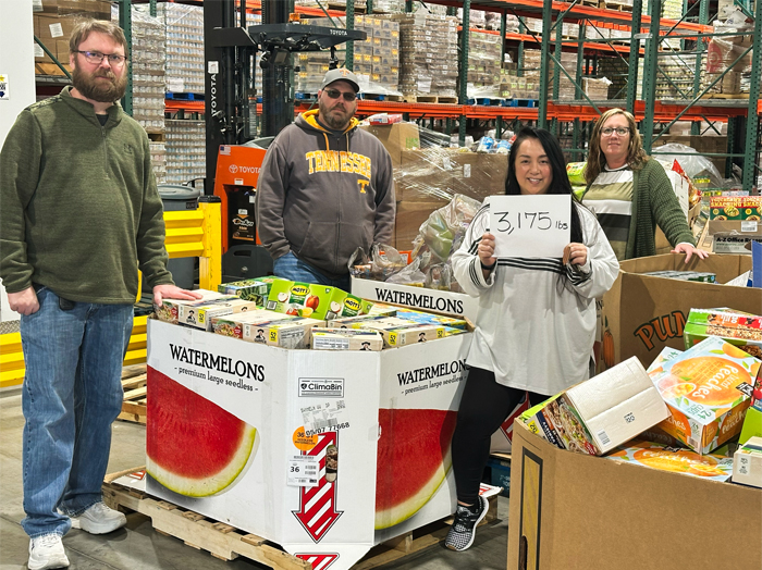 Book Systems food drive community involvement